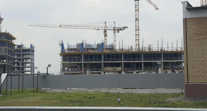 Строящийся офисный комплекс рядом с ЖК Проект Тушино, вид с Проектируемого проезда № 5484, фото 1 Квартирный контроль